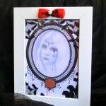 Framed portrait reproductio..